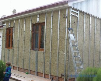 Come rinfoderare una casa in legno con rivestimenti con isolamento: istruzioni passo passo